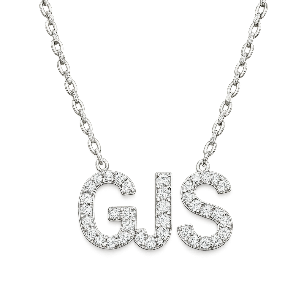 A white gold necklace studded with diamonds that spells out GJS on a transparent background